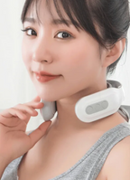 Woman wearing white cervical neck massager showing front placement and control panel