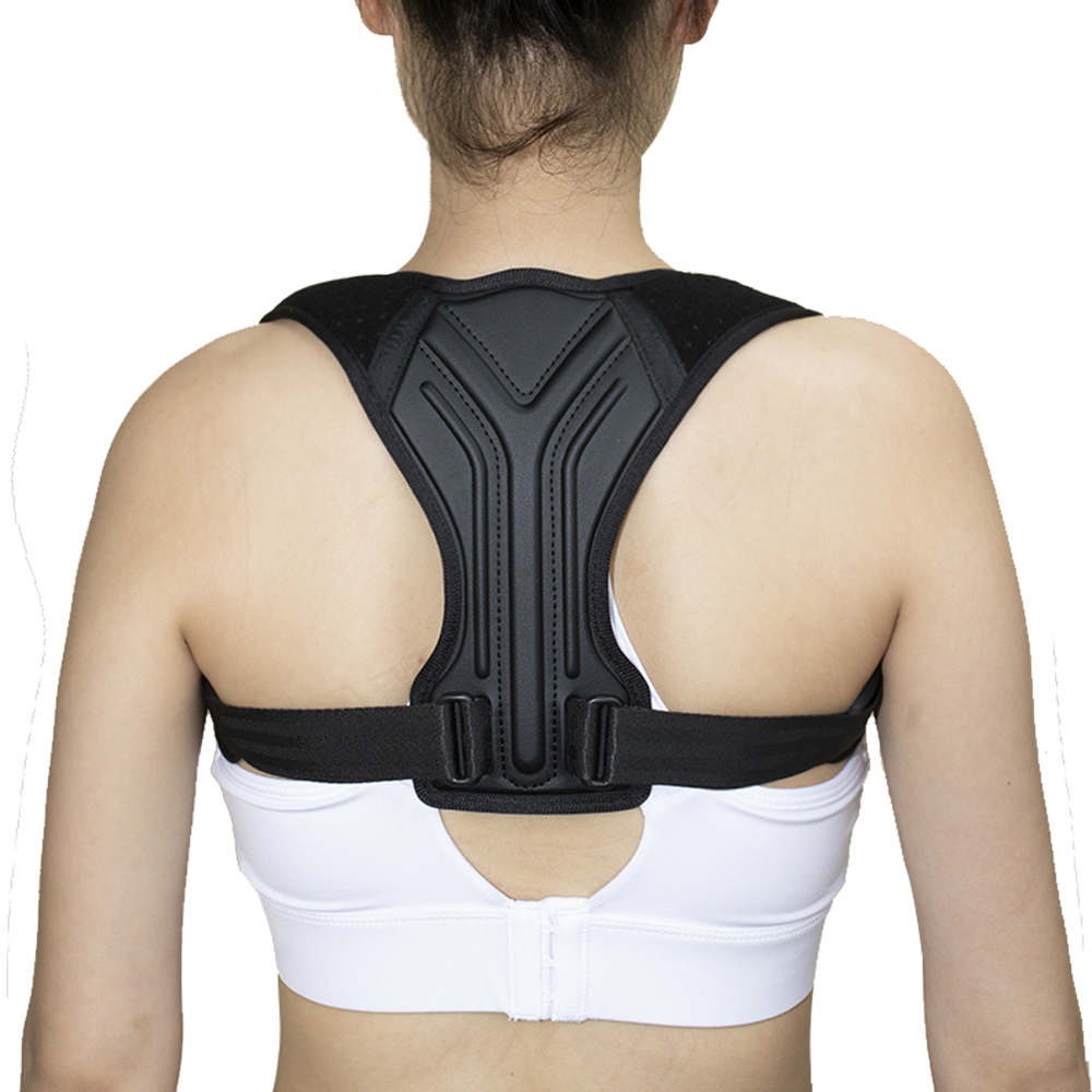 Woman wearing black invisible posture corrector brace showing upper back and shoulder alignment